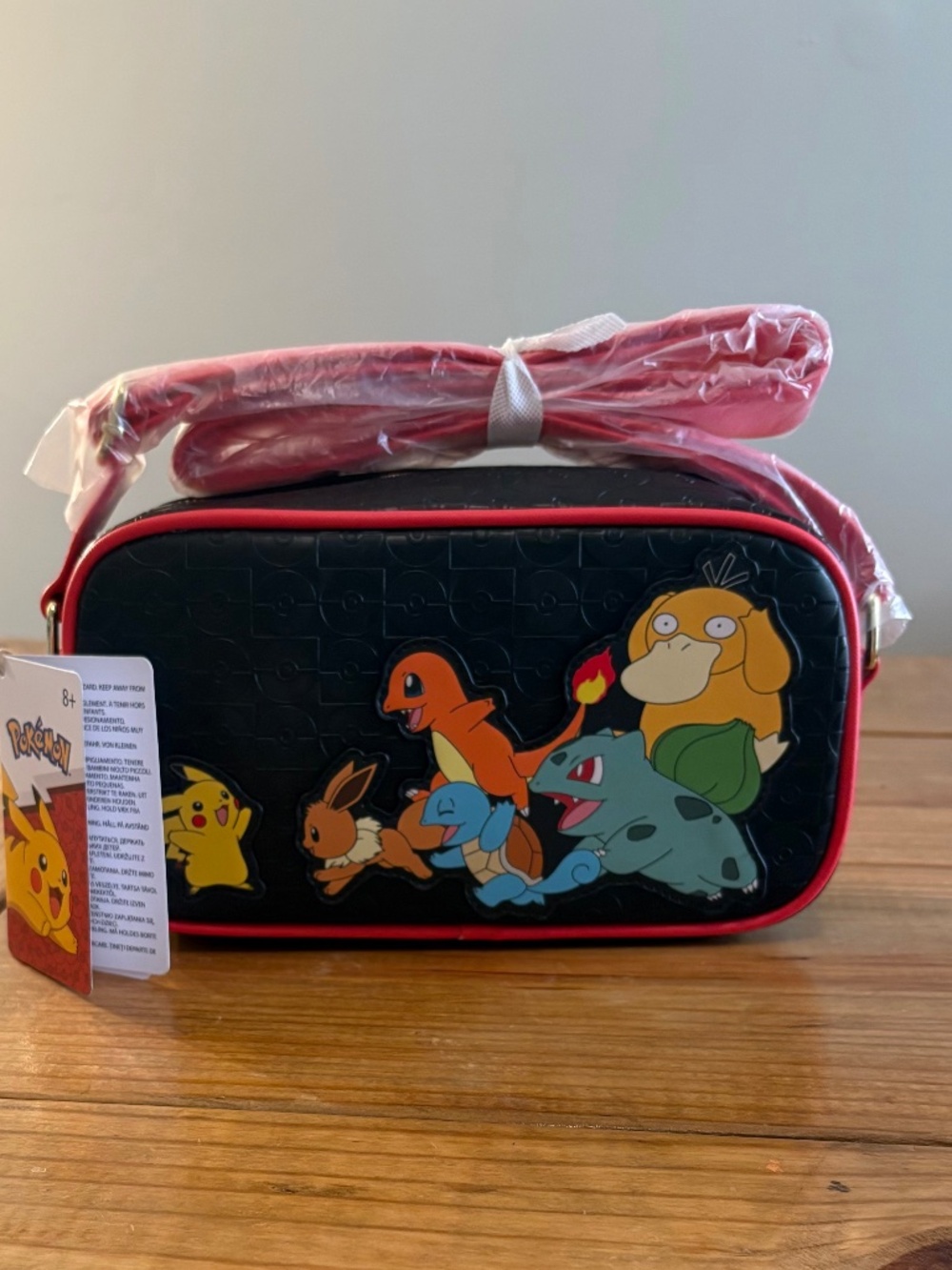 Loungefly Pokémon Leading the Team Crossbody bag